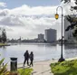 People walking beside Lake Merritt